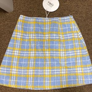 new tags still on mini skirt